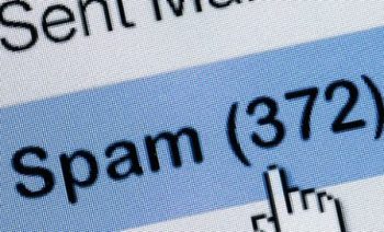 Distributed spam distraction hides illegal activities