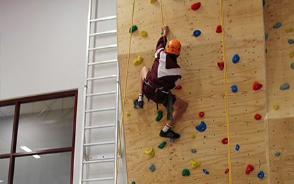 Climbing the wall in our new gym