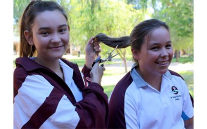 Girls lose locks for a cause