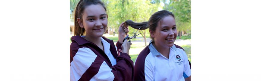 Girls lose locks for a cause