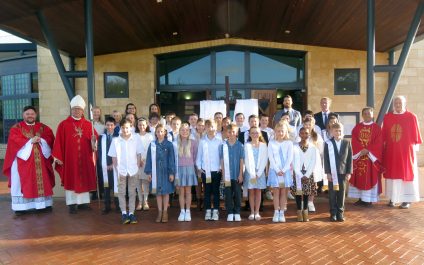 Bishop George celebrates with Year 6 students