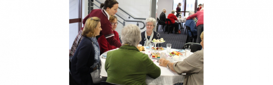 Hospitality students host parishioners for a high tea