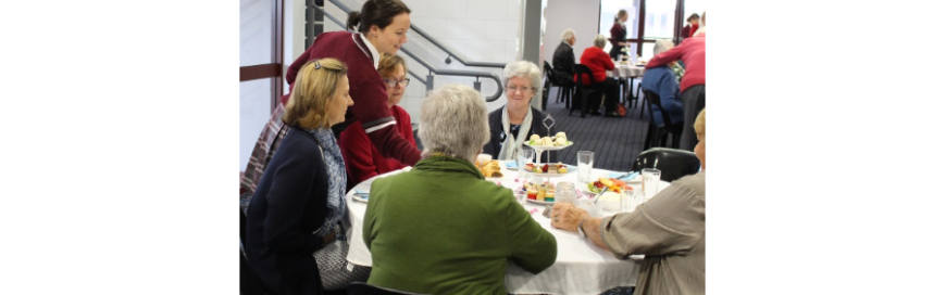 Hospitality students host parishioners for a high tea