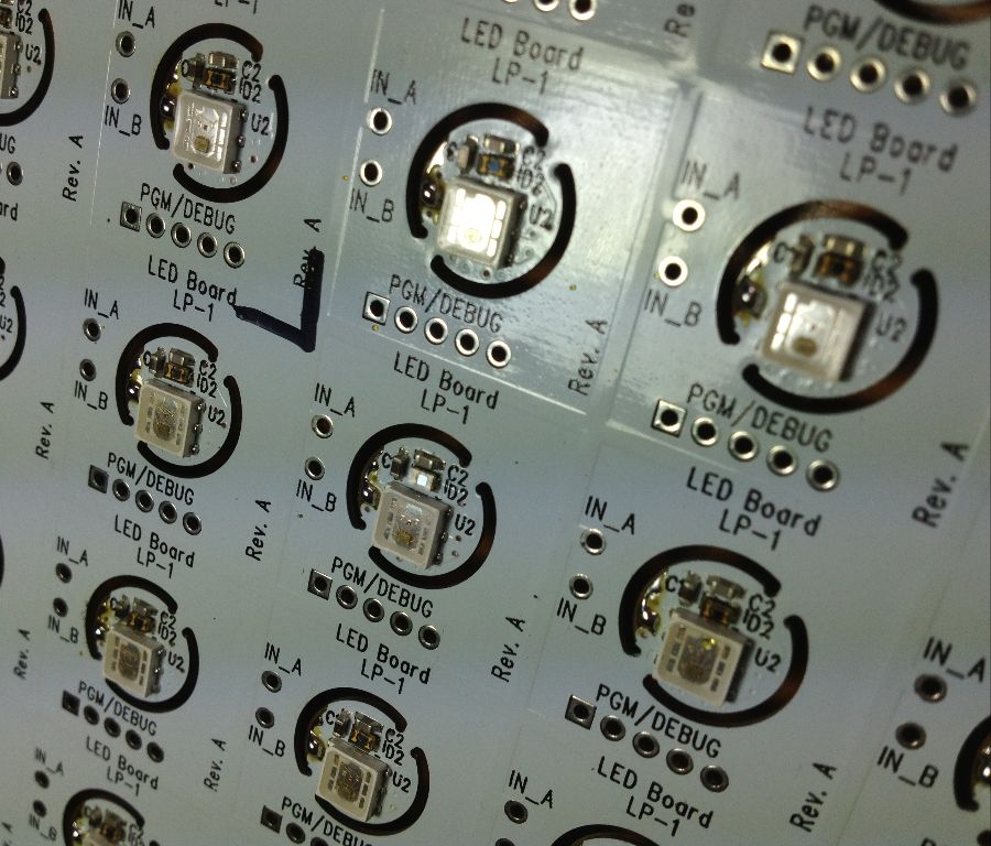 The individual boards are tiny -- shown here on a panel before being broken out.