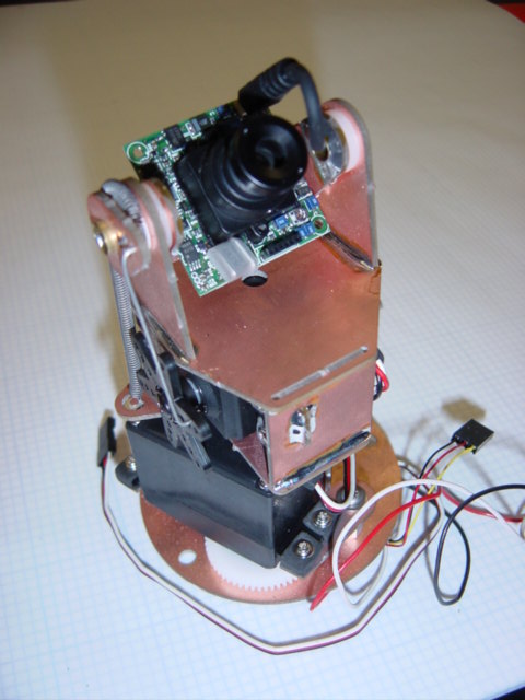 At the time, cheap robotic Pan/Tilt cameras weren’t available; so we designed our own, made-from-printed circuit board material.
