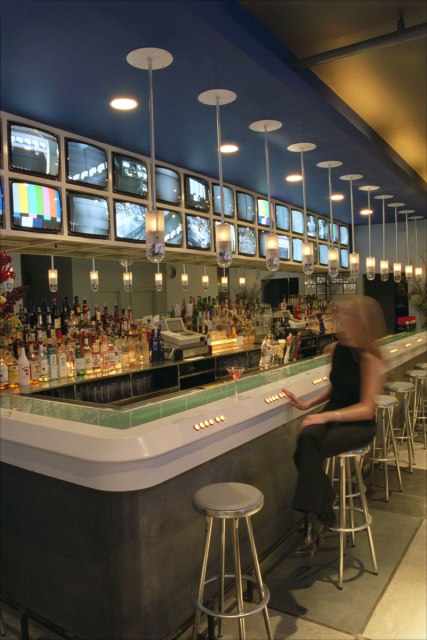 The bar itself featured lamps that contain pan-tilt cameras, buttons to control them, and an LED text ticker embedded in the bar surface.