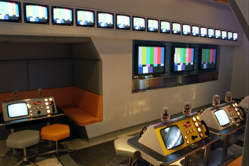 All the monitors were cheap “cable ready” consumer TV sets. A system of infrared LEDs sent commands to each one to select the channel.