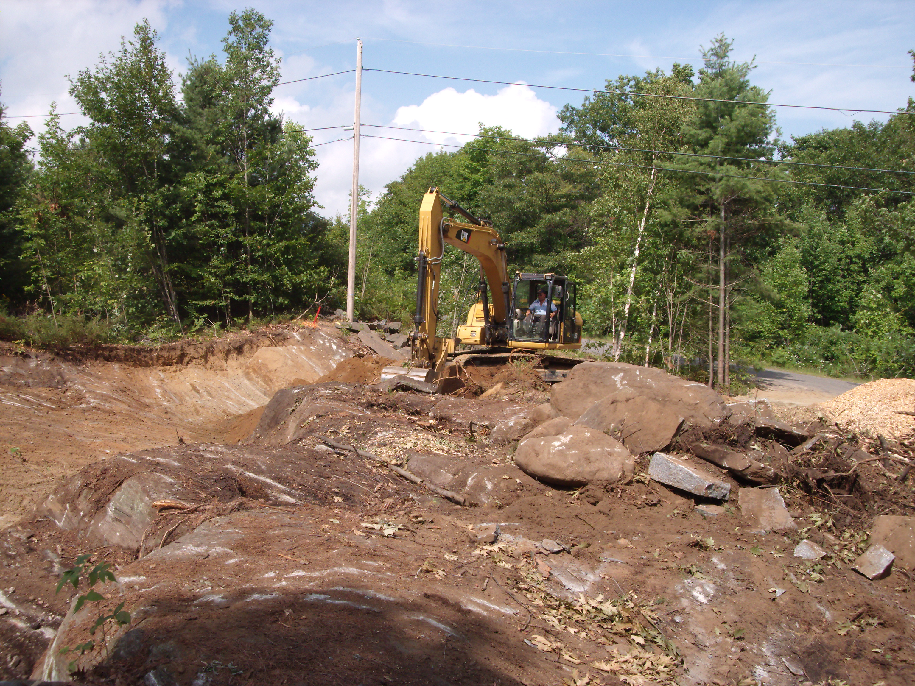 Site soil removed to shallow bedrock