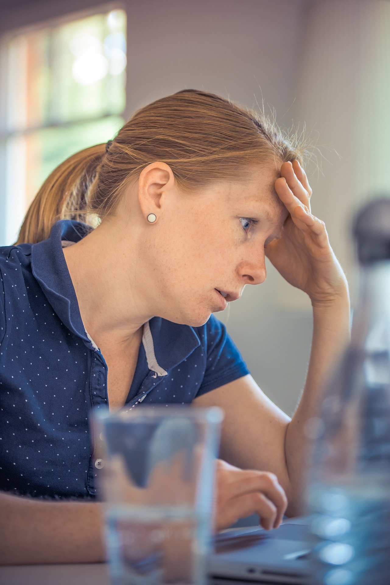 Adult female business owner stressed out