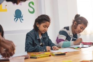 Children in school working on projects together