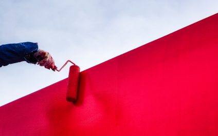 How do custom-formulated paints drive business growth?