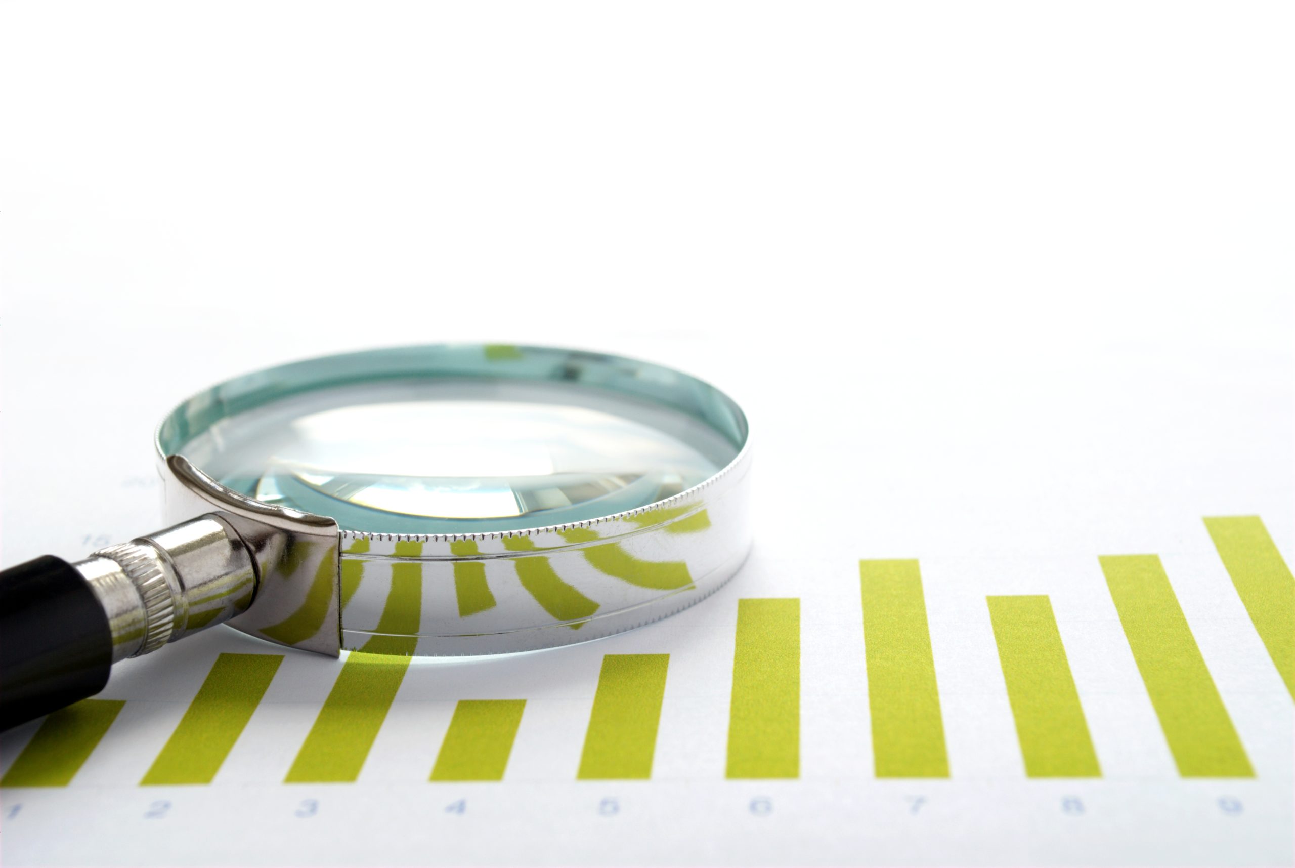 chart-and-a-magnifying-glass-E9L9UX3-scaled