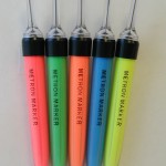 Picture of a Fan of 5 Fluorescent markers Red, Green, Orange, Blue and Yellow that can be used for , torque seal, permanent or fault marking.